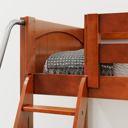 Wooden bunk bed with ladder and patterned blanket.