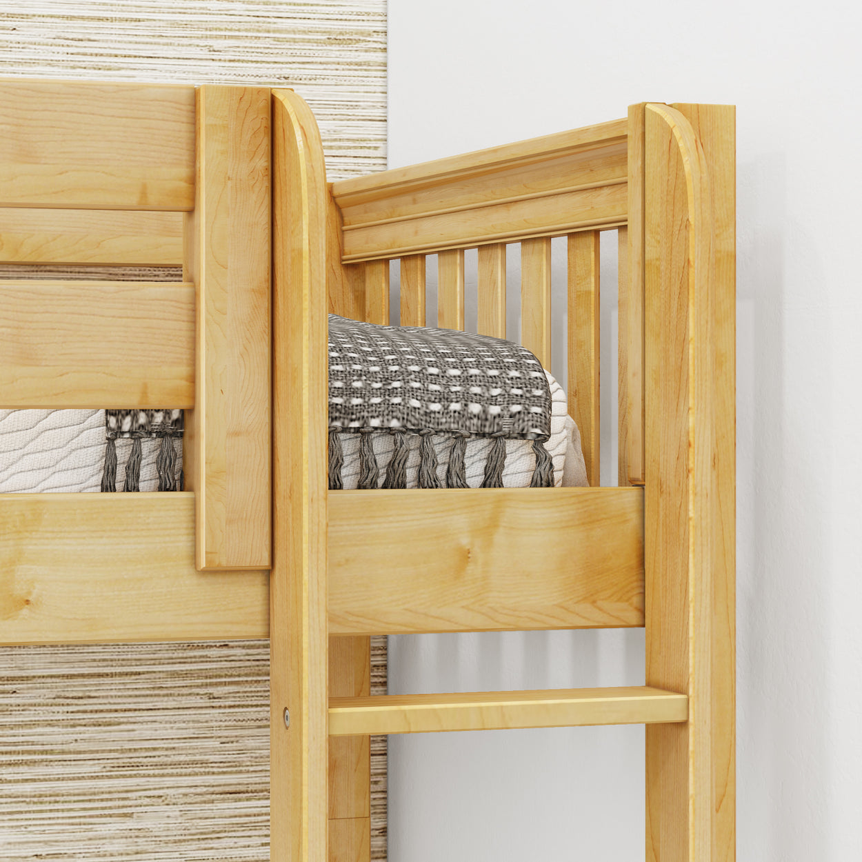 Natural wood bunk bed with gray patterned blanket in modern bedroom.