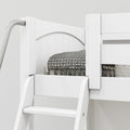 Close-up of modern white wooden bunk bed ladder and guardrail with textured gray knit blanket