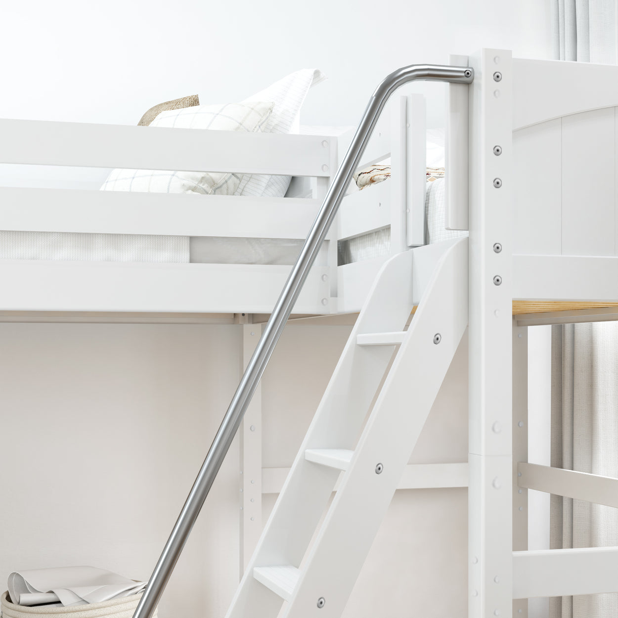 White wooden loft bed with metal safety rail and ladder in modern bedroom.