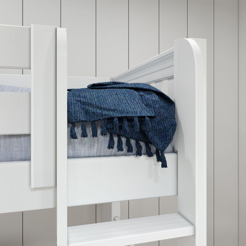Close-up of a white wooden bunk bed with navy blue tasseled throw and light gray paneled wall in a modern bedroom