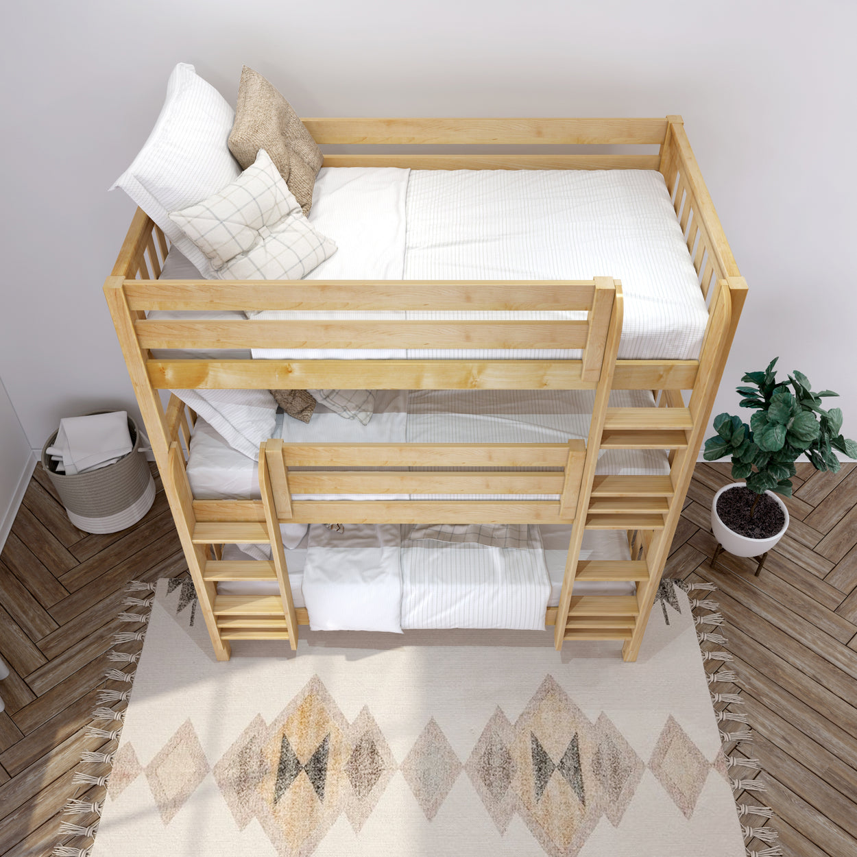 Wooden bunk bed with white bedding in a stylish bedroom with a plant and geometric rug.