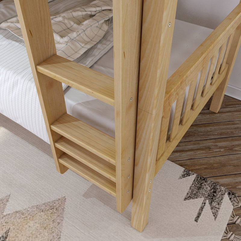 Close-up of natural pine wooden bunk bed ladder and slatted bed frame with beige checked bedding on hardwood floor