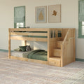 Solid wood kids bunk bed with stairs and built-in storage, green bedding, striped roman shades and minimalist framed art in a cozy children's bedroom