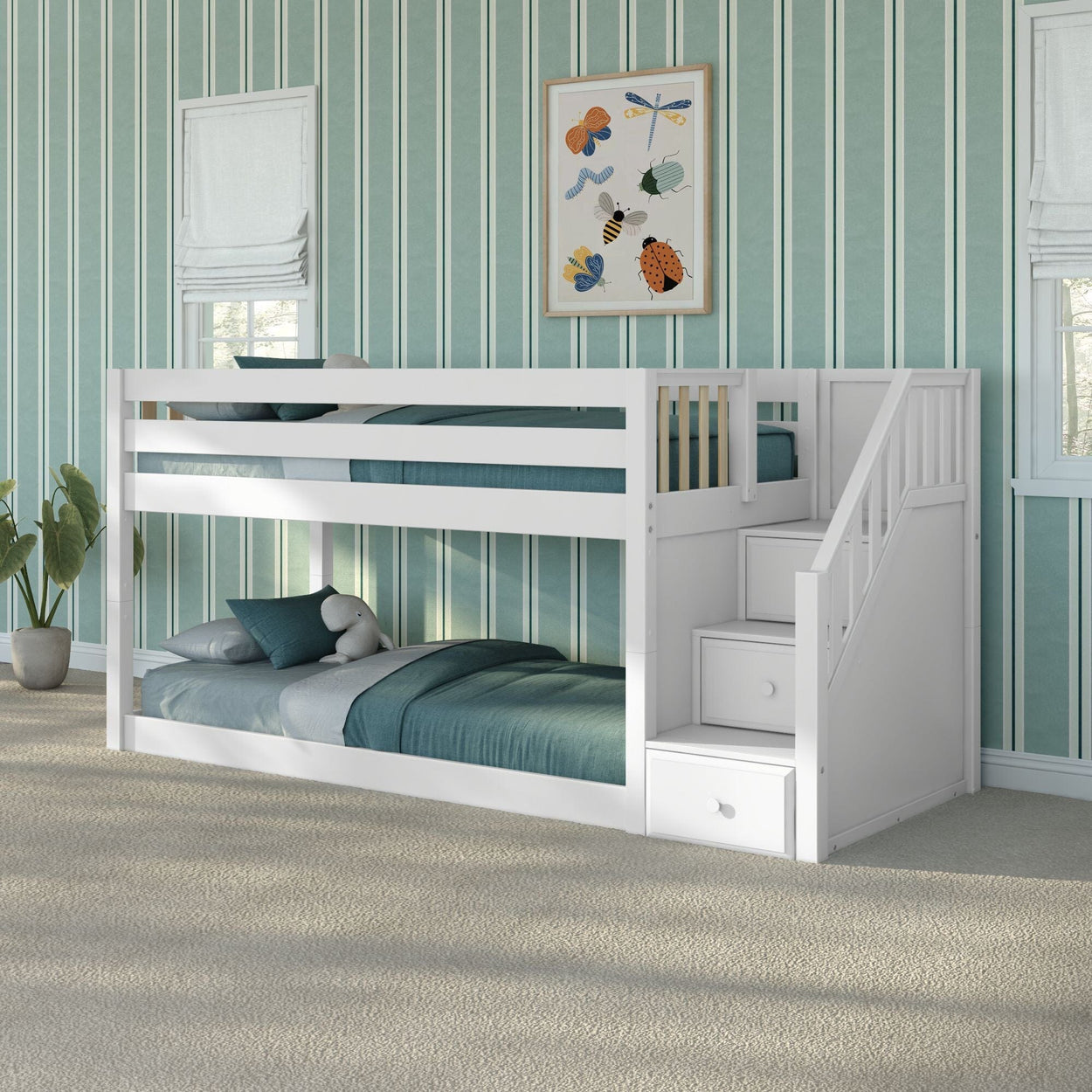White wooden twin-over-twin bunk bed with built-in staircase and storage drawers, teal bedding in children's bedroom with teal striped wallpaper