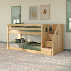 Twin-over-twin maple wood bunk bed with built-in storage stairs and drawers in modern children's bedroom with green bedding, plush toys and framed wall art