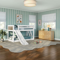 Modern kids bedroom with white bunk bed and slide, teal striped wallpaper, wooden dresser, plush rug, caterpillar toy and natural light