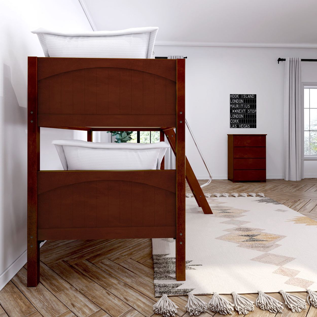 Wooden bunk beds in a modern bedroom with parquet flooring and a geometric rug.