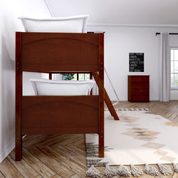 Wooden bunk beds in a modern bedroom with parquet flooring and a geometric rug.