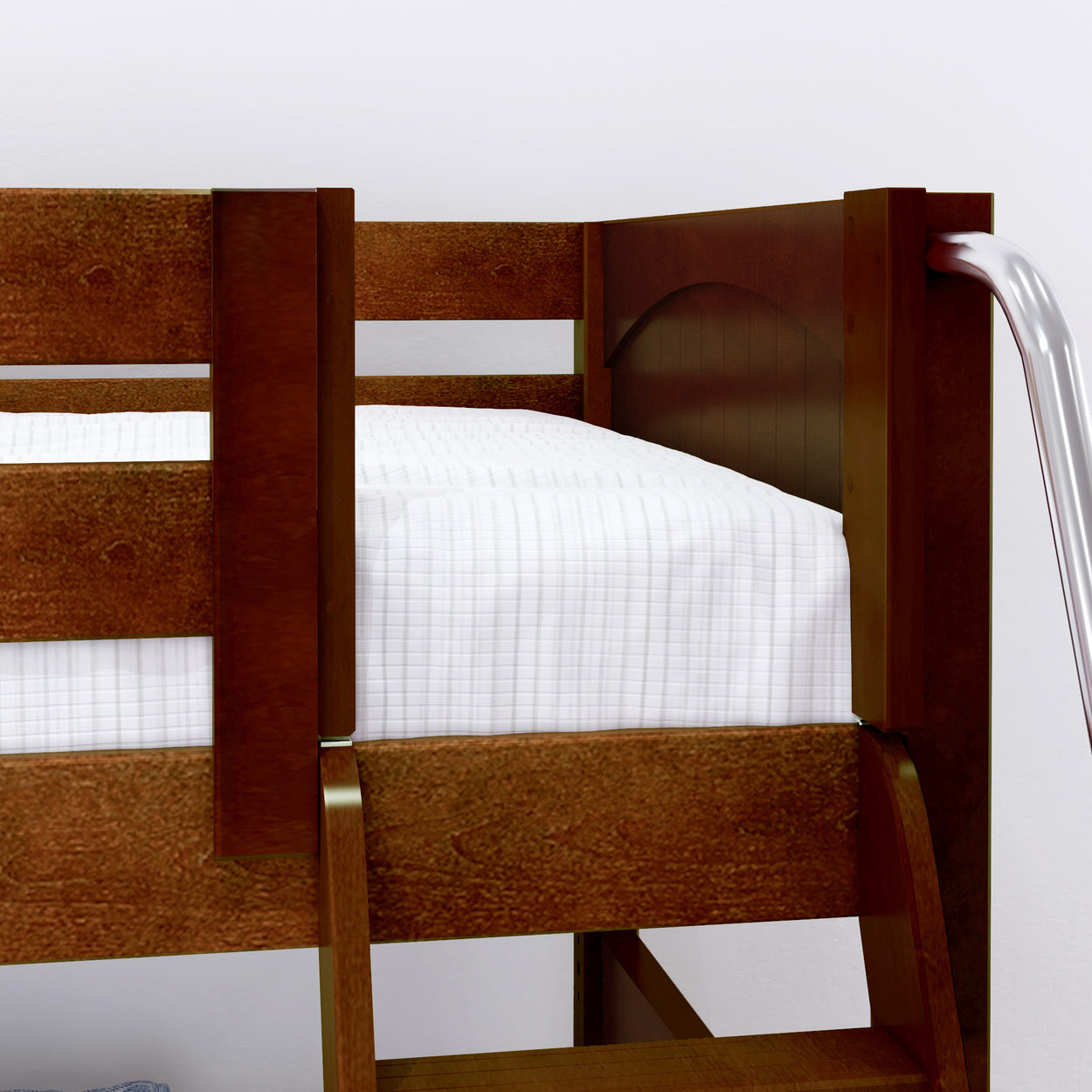 Wooden bunk bed with white checkered bedding in a modern bedroom setting.