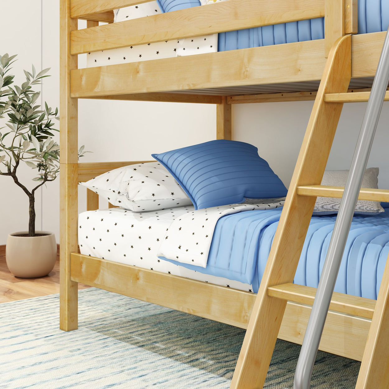Wooden bunk bed with blue bedding and decorative pillows in a modern bedroom setting.
