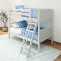 White wooden twin-over-twin bunk bed with blue quilted bedding, safety rails and ladder in modern kids' bedroom