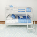 White wooden bunk bed with blue quilted bedding, star-print sheets and ladder in modern kids' bedroom, space-saving design
