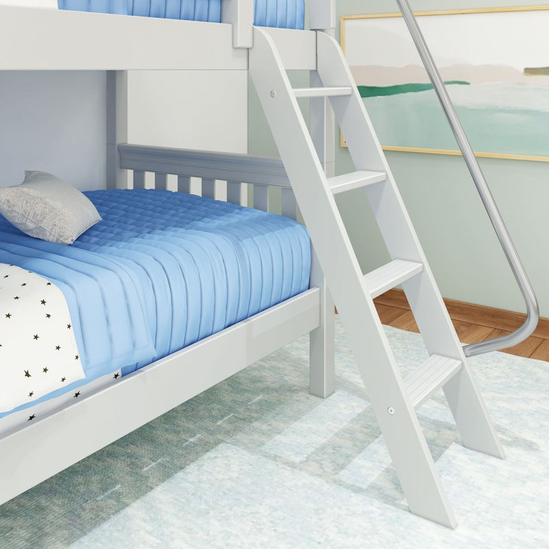 White wooden bunk bed ladder next to blue quilted bedding in modern children's bedroom — kids loft bed and nursery decor
