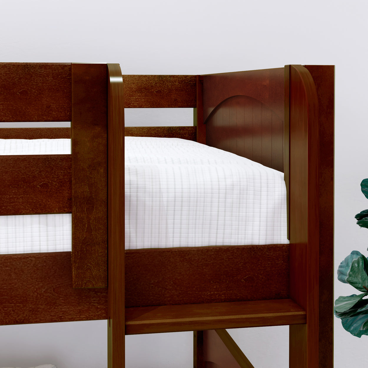 Loft bed with wooden frame and white bedding in a modern bedroom setting.