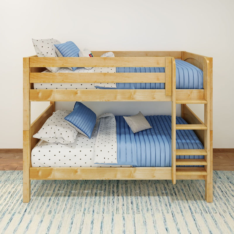 Natural wood bunk bed with blue quilted bedding, star-print sheets and ladder in children's bedroom