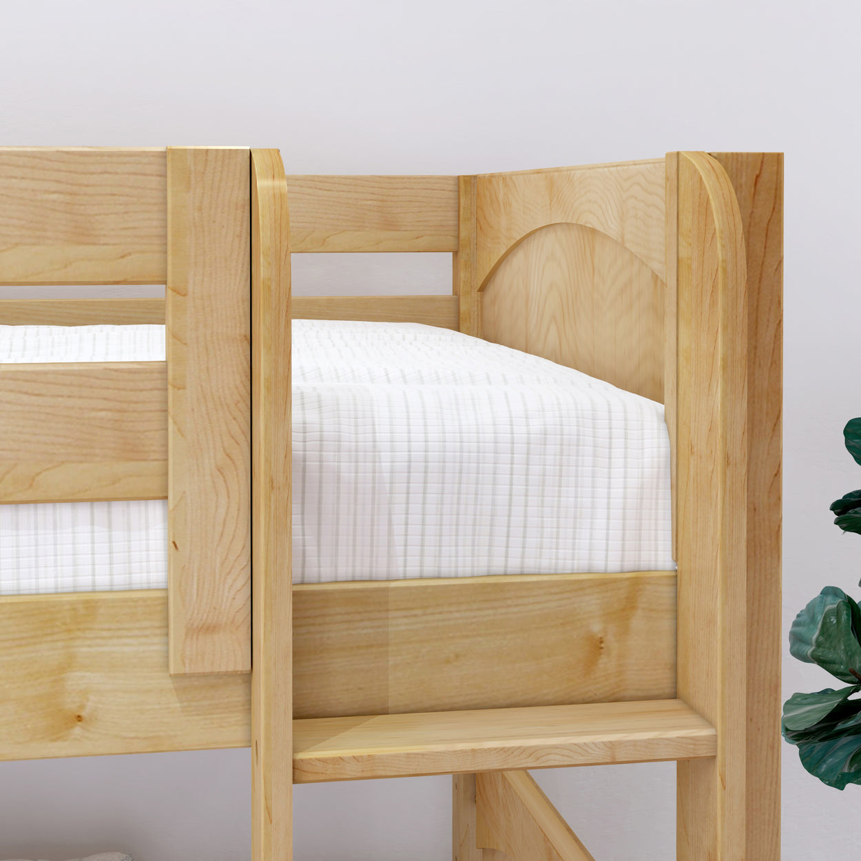 Wooden bunk bed with white plaid bedding in a modern bedroom setting.