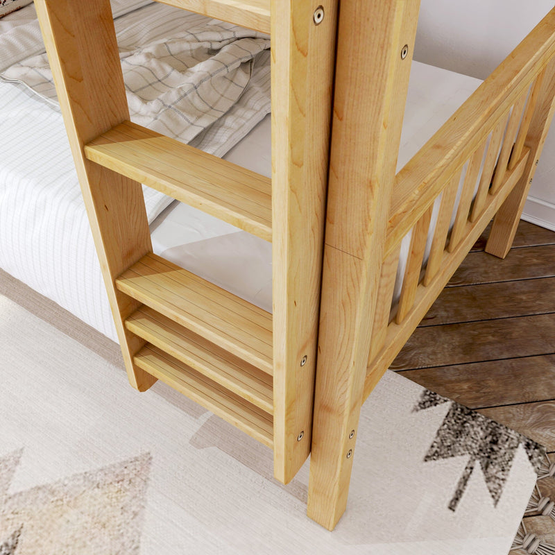 Solid light-pine bunk bed ladder and slatted bed frame with plaid bedding and white mattress on hardwood floor in a modern kids' bedroom