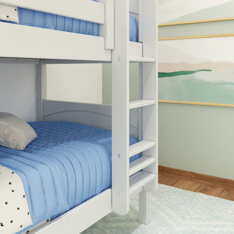 White wooden bunk bed ladder with blue quilted bedding in a kids' bedroom featuring hardwood floors and a soft coastal wall mural