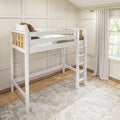 White wooden loft bed with ladder and wood slats in a bright neutral kids bedroom with paneled walls, white curtains, hardwood floor and patterned rug
