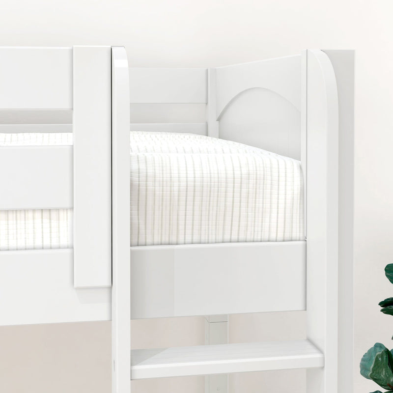 Close-up of a white wooden twin-over-twin bunk bed with protective guardrail and neutral plaid bedding in a modern kids' bedroom.