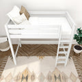 White loft bed with ladder and white bedding, neutral throw pillows, herringbone wood floor and geometric rug in a modern Scandinavian bedroom