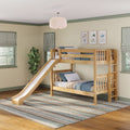 Natural wood kids bunk bed with slide in bright children's room, blue bedding, striped rug, pendant light, potted plant and airplane wall art