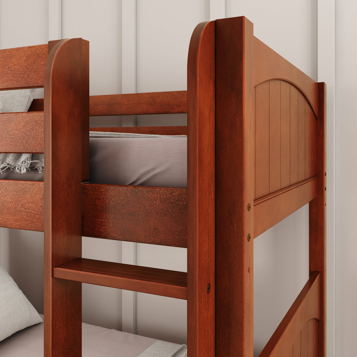Wooden bunk bed with a dark finish and minimalistic design in a modern bedroom setting.
