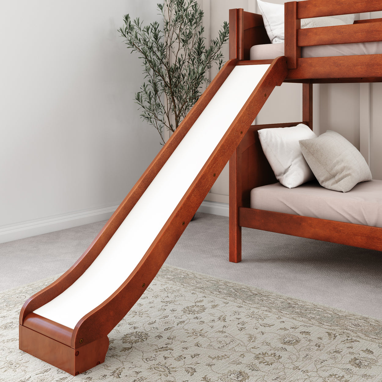 Bunk bed with slide in modern kids' room featuring wooden furniture and neutral decor.