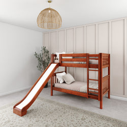 Wooden bunk bed with slide in modern kids' room with a rug and a hanging lamp.