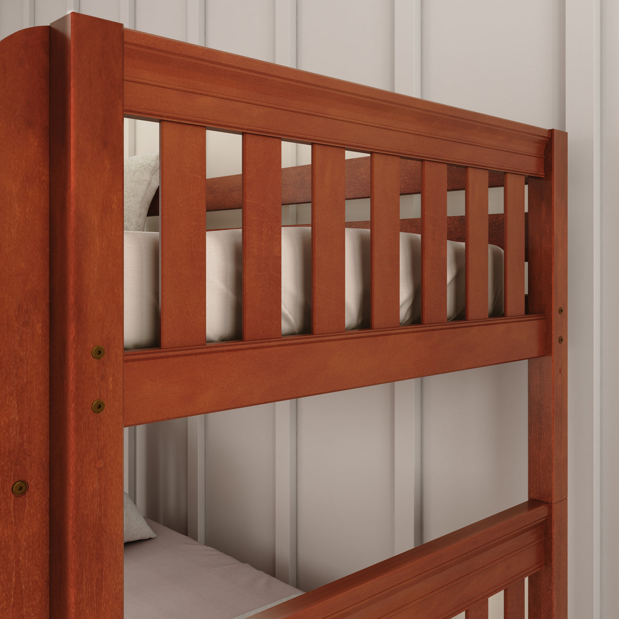 Wooden bunk bed with a rich cherry finish in a modern bedroom setting.