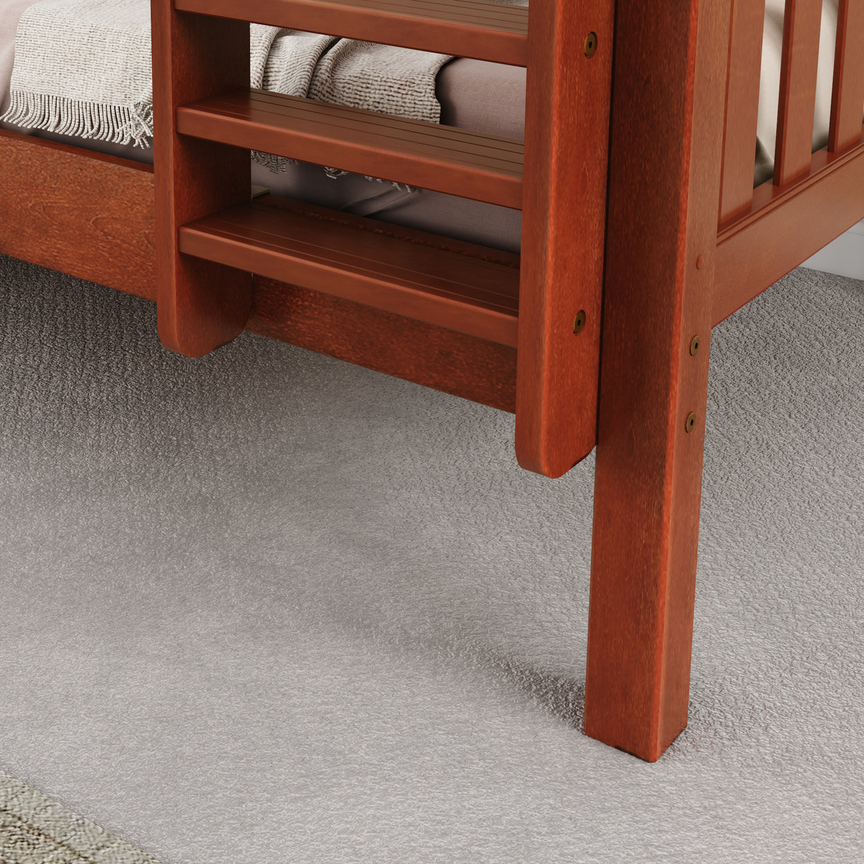 Solid wood bunk bed with ladder on a soft gray carpet in a cozy bedroom setting.
