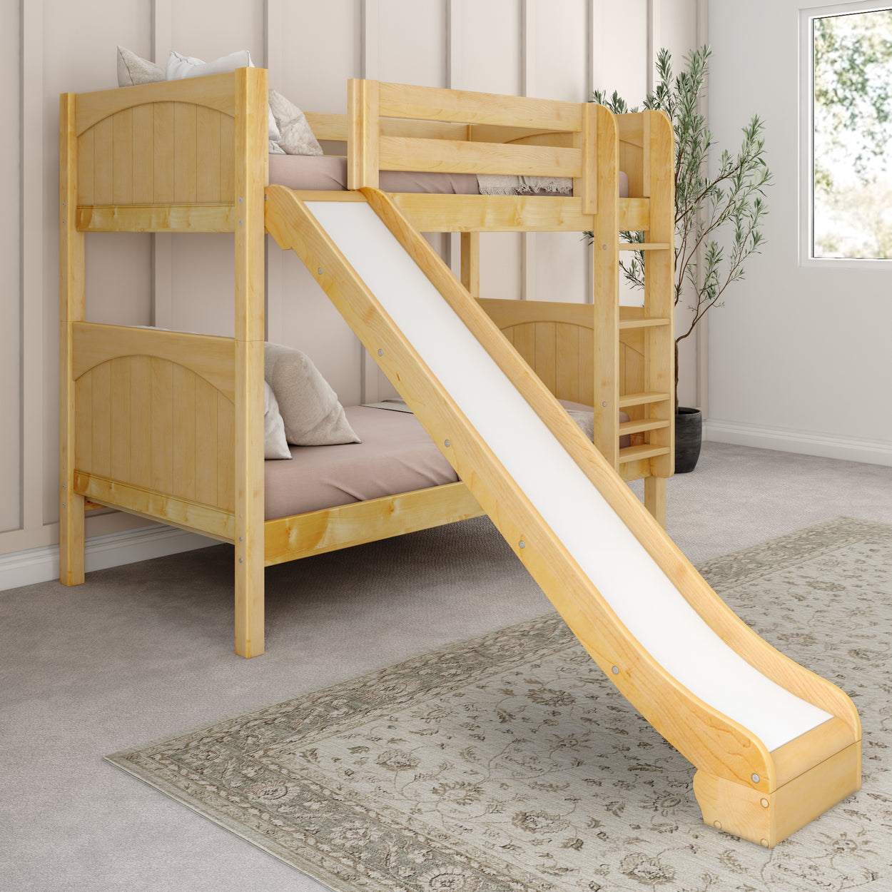 Children's wooden bunk bed with slide in modern bedroom setting.