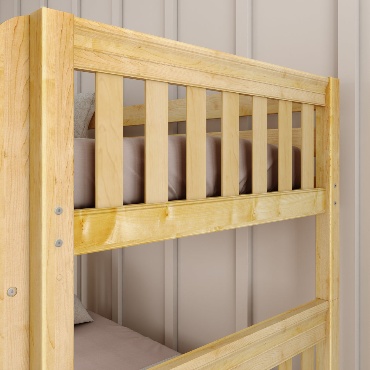 Wooden bunk bed frame against a beige wall, displaying sturdy construction and natural finish.