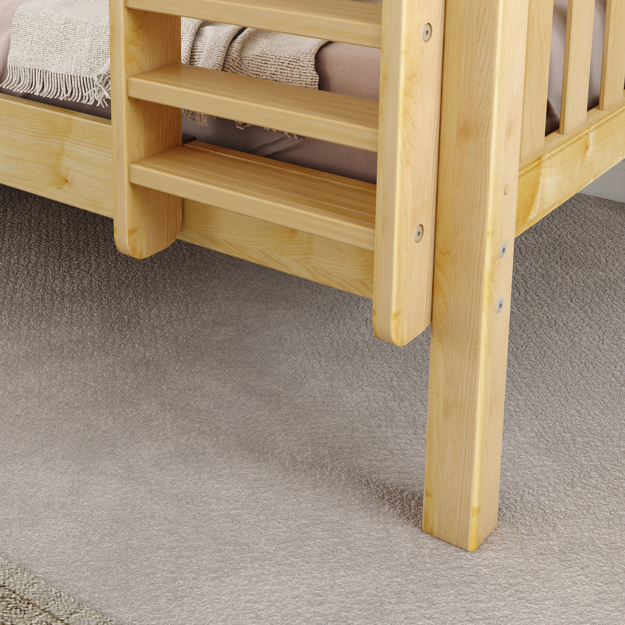 Wooden bunk bed ladder and frame close-up on soft carpet flooring.