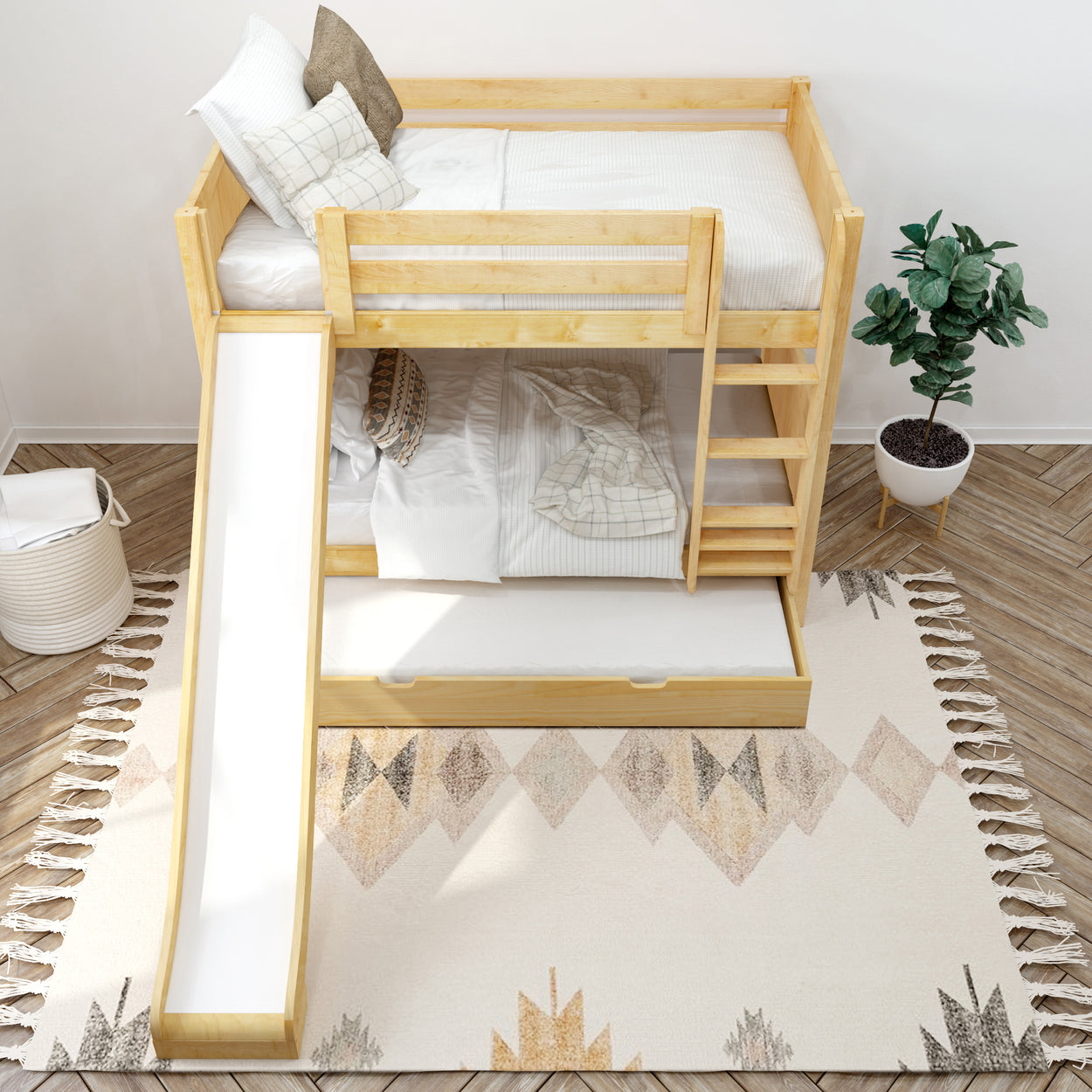 Wooden bunk bed with slide, white linens, decorative rug, and green plant for modern kids' bedroom.