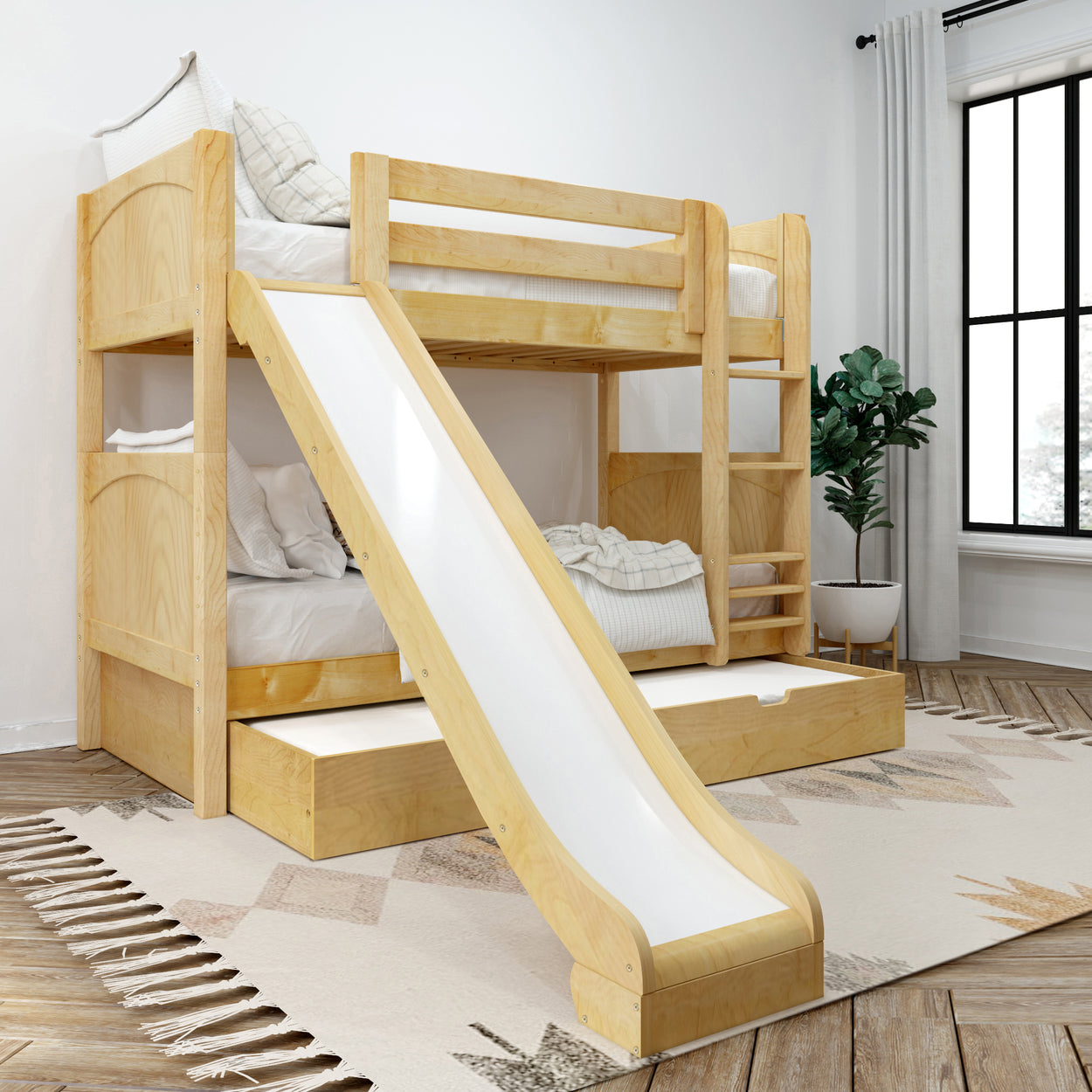 Wooden bunk bed with slide and storage drawers in a cozy children's bedroom.