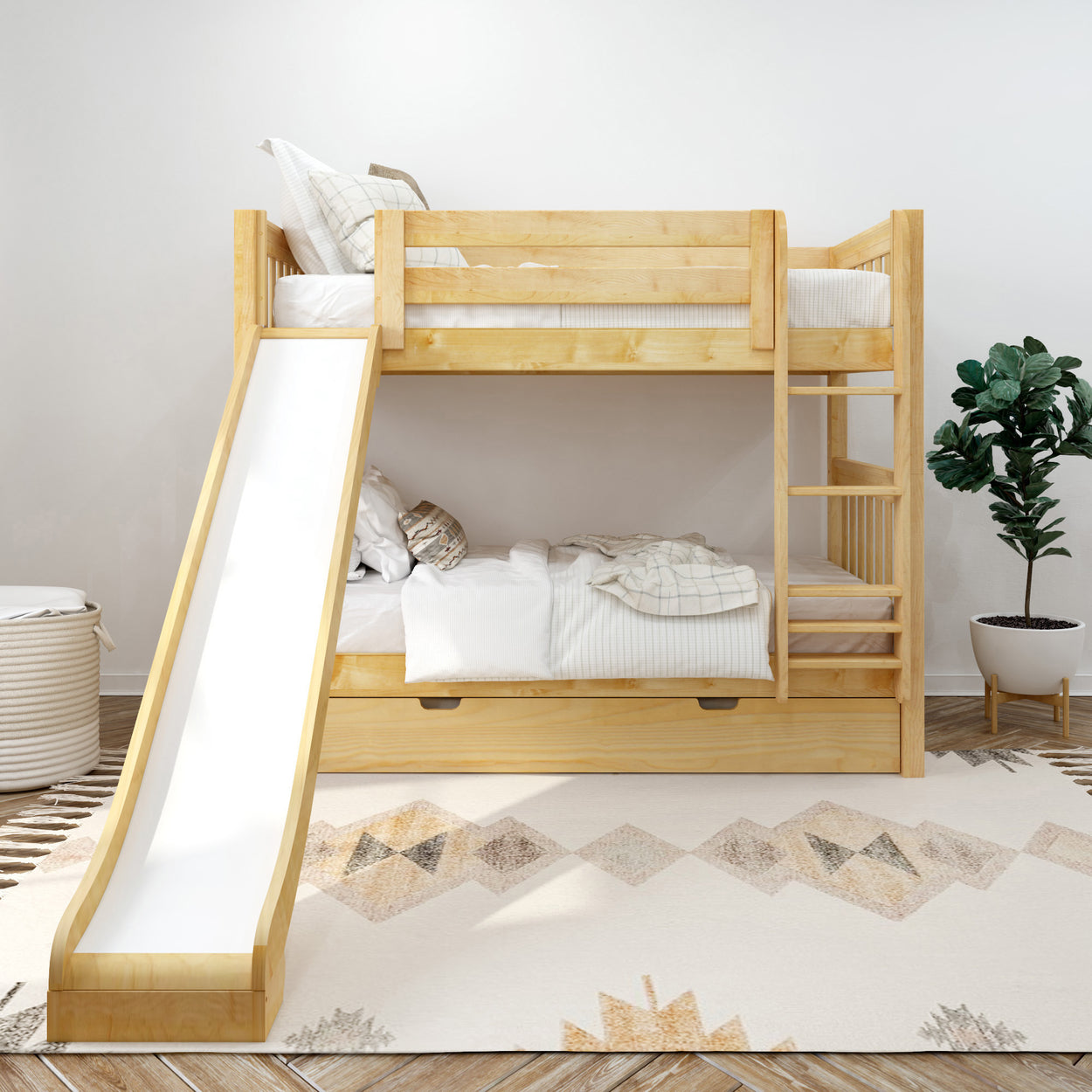 Children's wooden bunk bed with slide in a modern bedroom featuring white bedding and a geometric patterned rug.