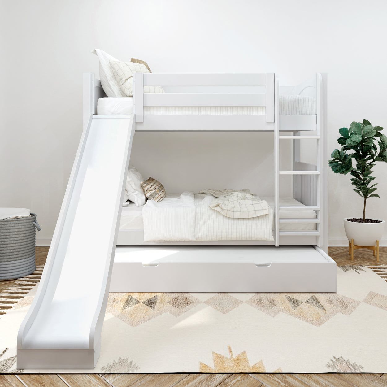 White wooden bunk bed with slide in modern children's bedroom, featuring striped bedding and geometric rug.