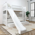 White wooden twin-over-twin bunk bed with slide, ladder and under-bed storage drawer in a modern kids' bedroom with large window and plant