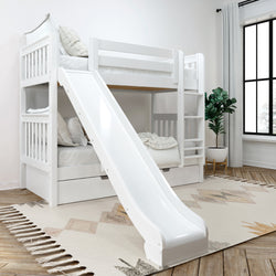 White bunk bed with slide in modern kids' room, featuring cozy bedding and a stylish area rug.