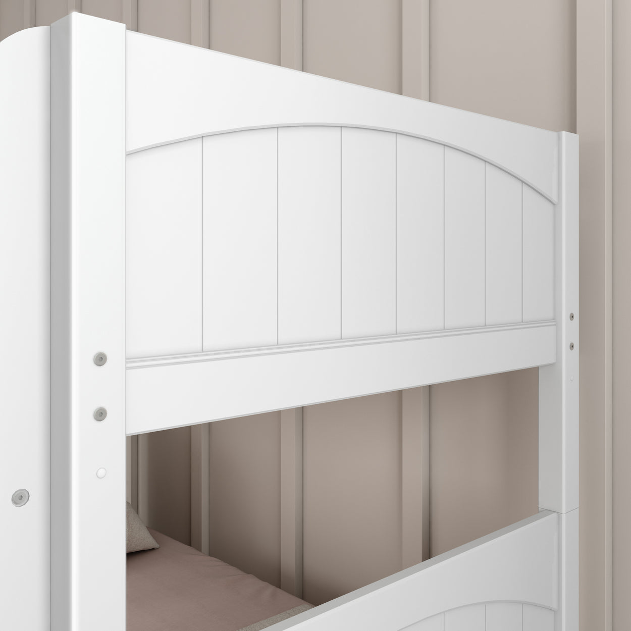 White wooden bunk bed frame close-up against beige wall in modern bedroom.