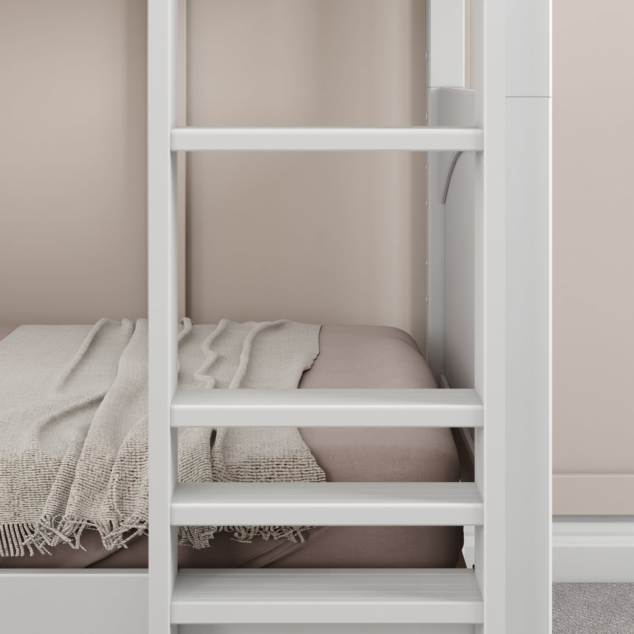 White bunk bed interior with beige bedding and a cozy blanket in a modern bedroom setting.