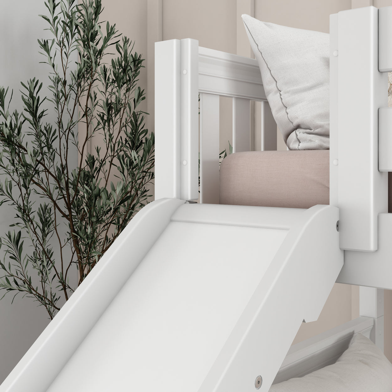 Children's loft bed with slide and cushion in modern bedroom design featuring indoor plant.