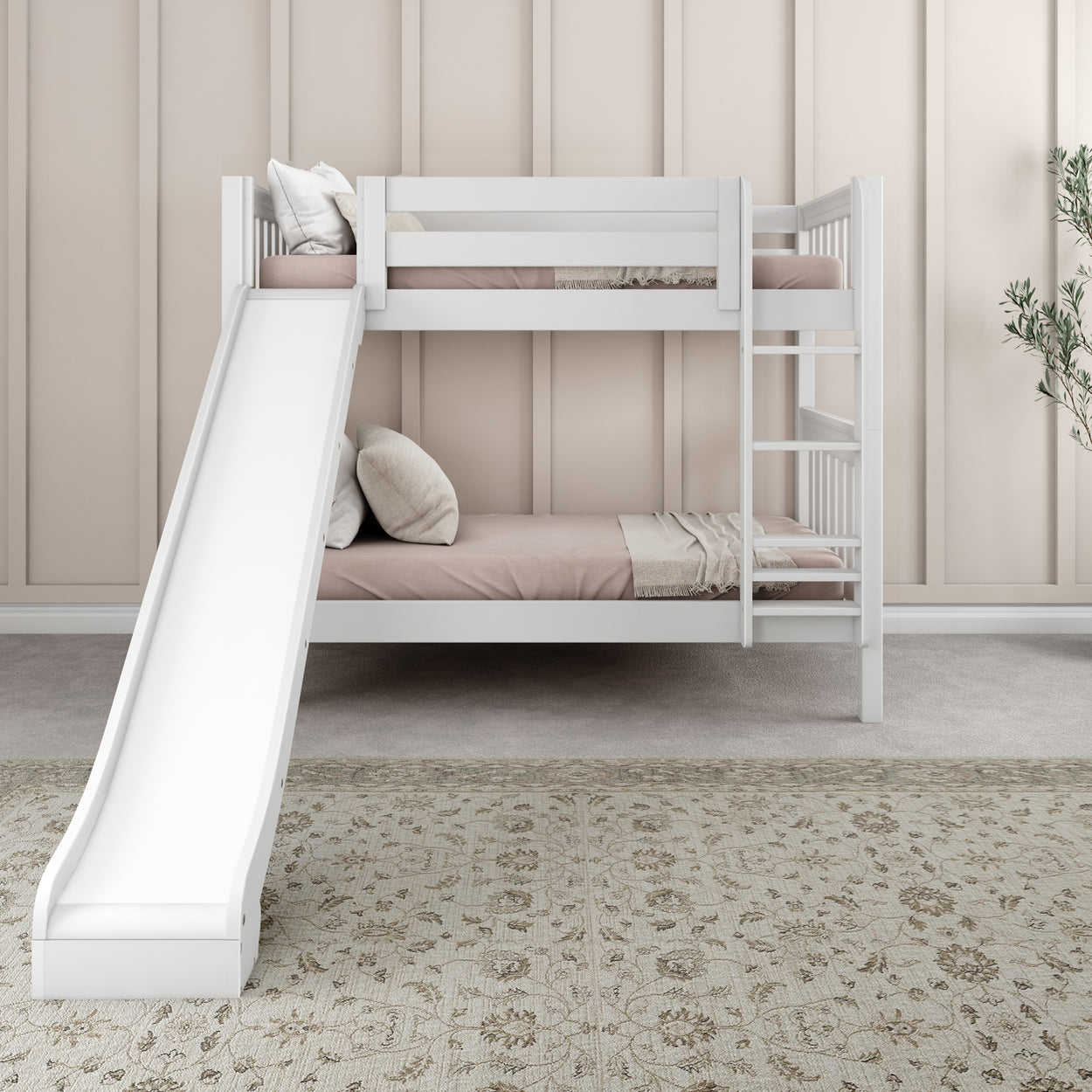 Modern white bunk bed with slide and ladder in a minimalist beige bedroom.