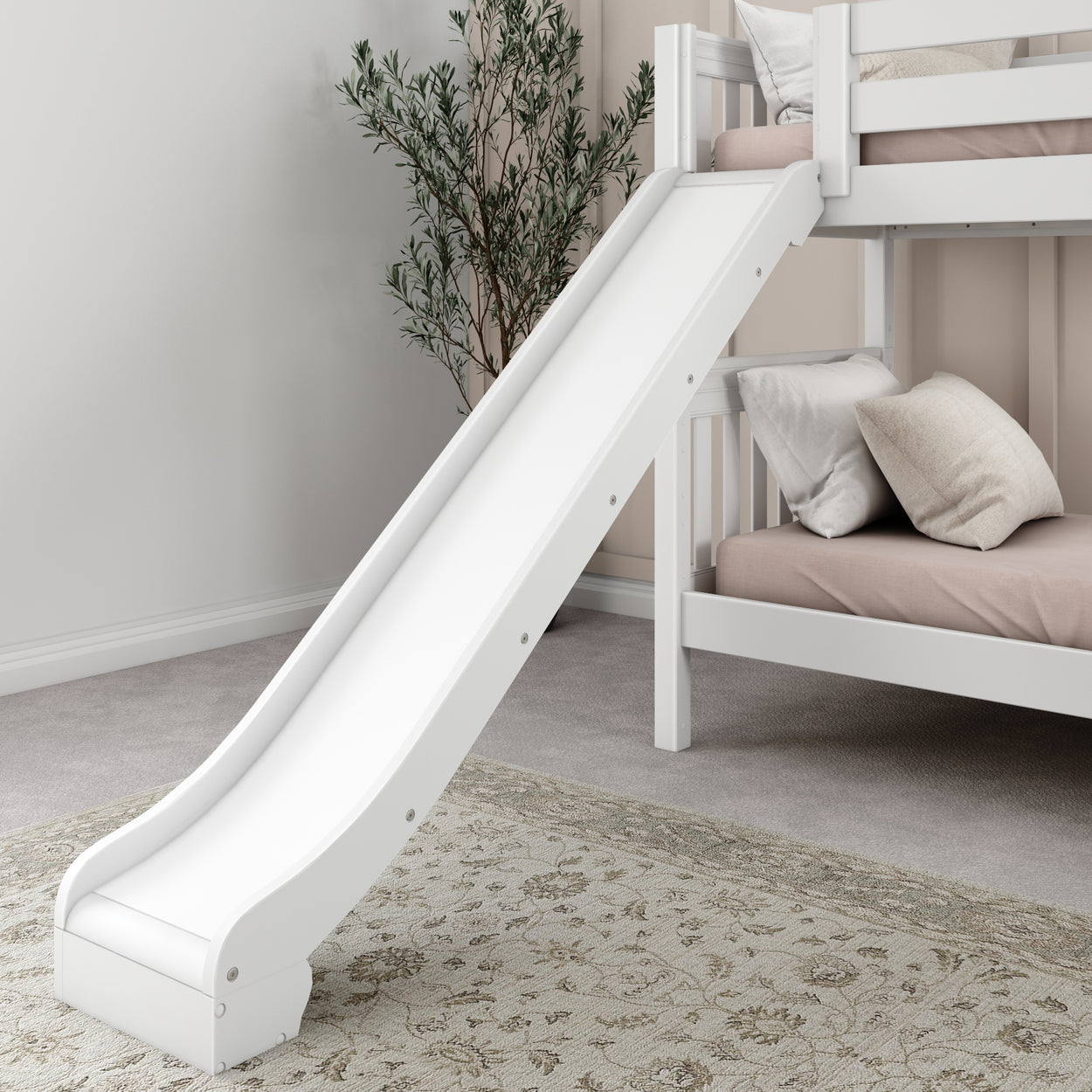 White bunk bed with slide and pillows in a cozy bedroom setting.