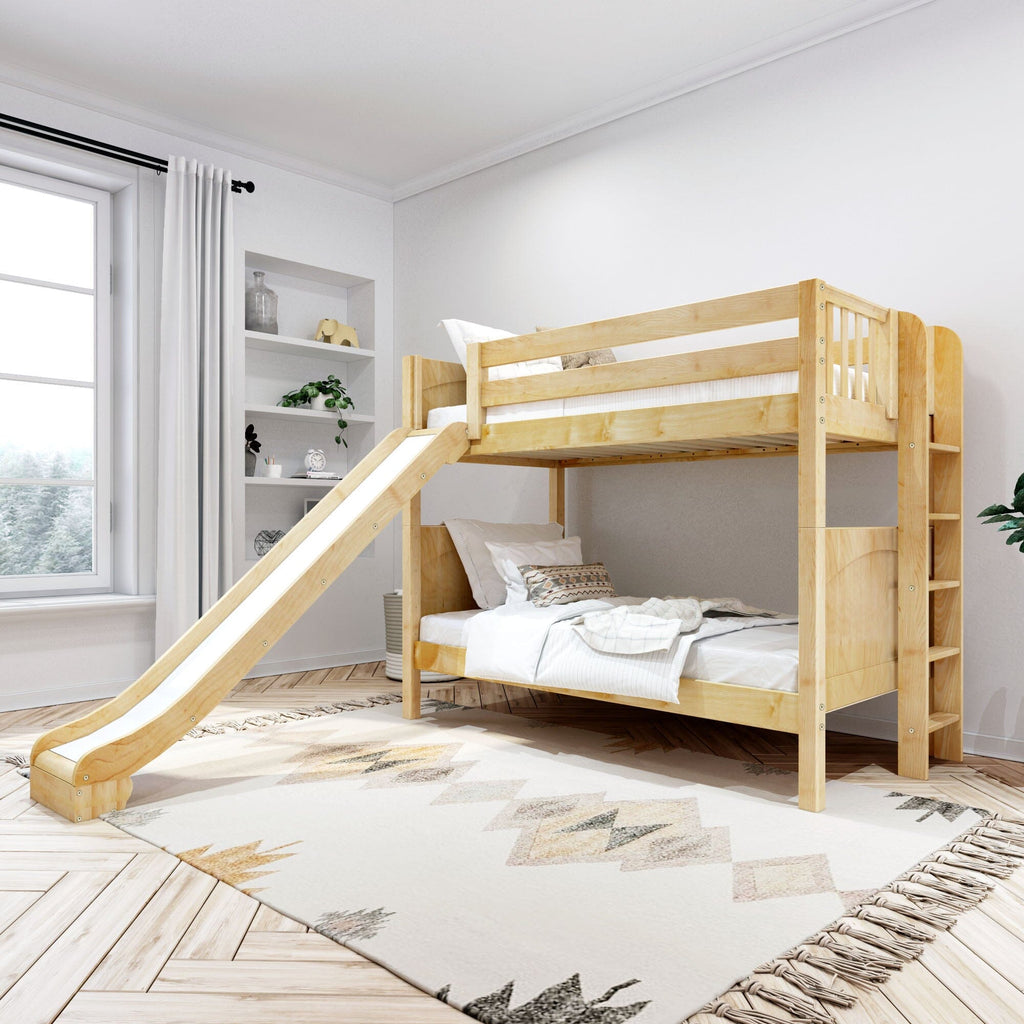 Natural wood loft bunk bed with slide in bright Scandinavian-style kids' bedroom with white curtains, built-in shelves, patterned rug and cozy bedding