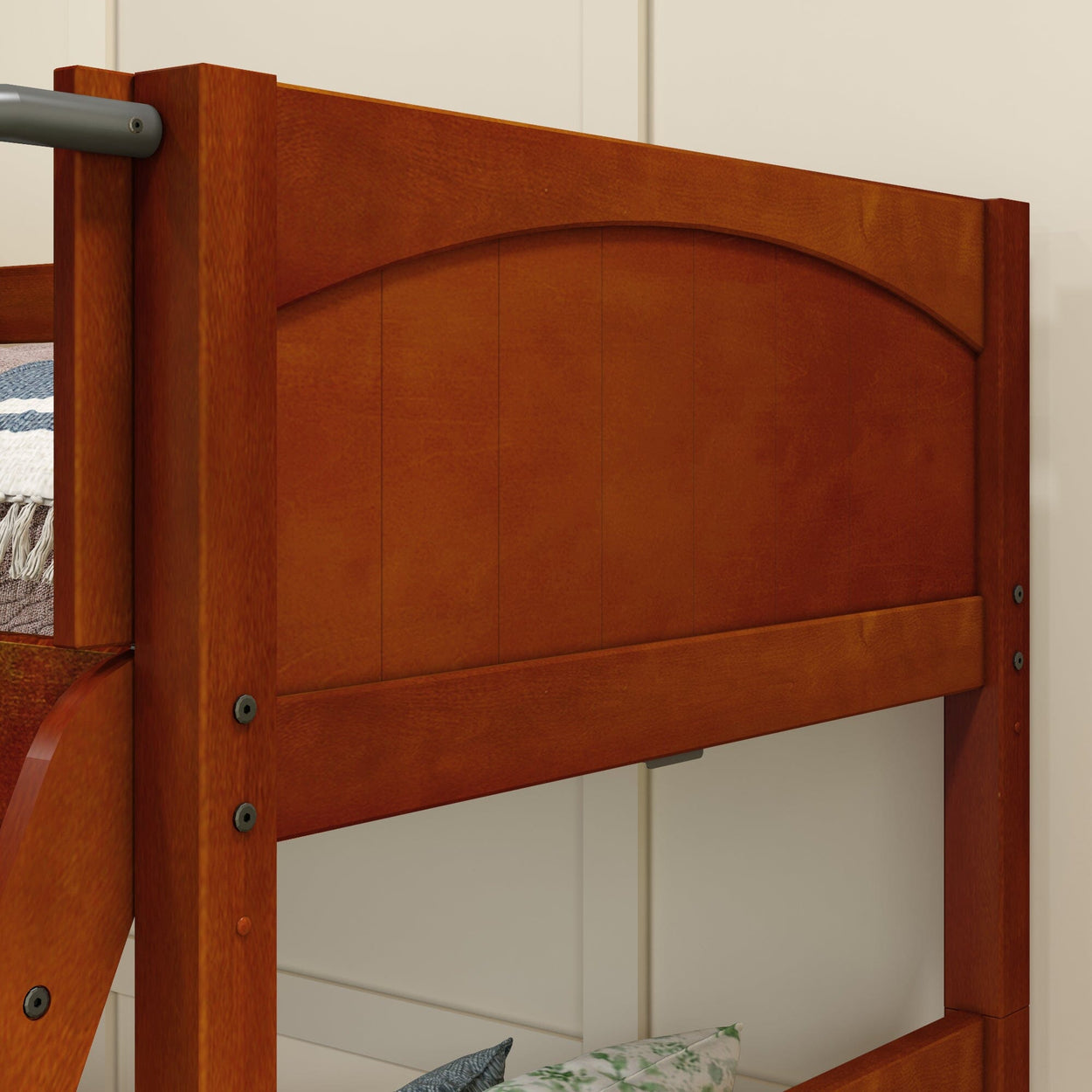 Wooden bunk bed corner detail showing warm brown finish.