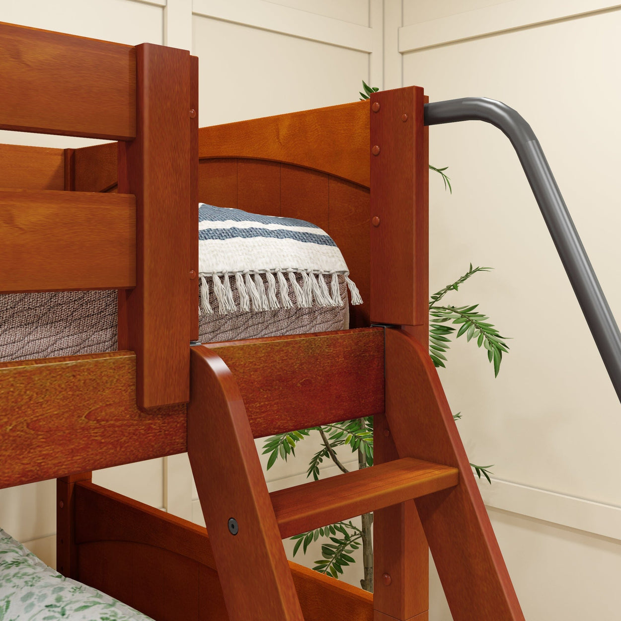 Wooden bunk bed with ladder and striped throw blanket in a cozy bedroom setting.