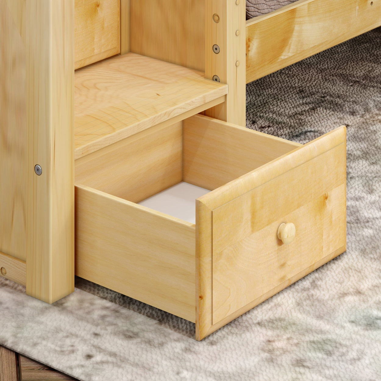Open light wood drawer on a vintage cabinet showing spacious interior storage.